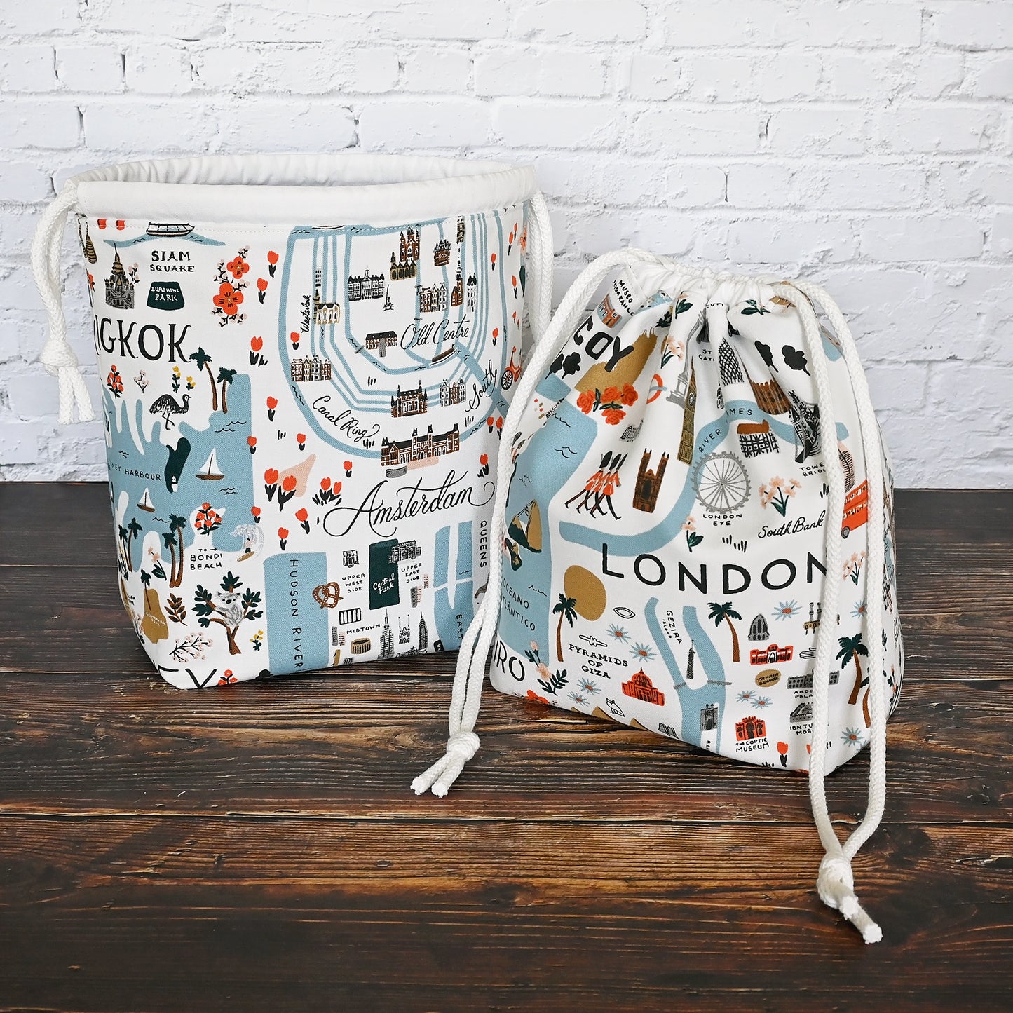 Fun drawstring project bags made from the World Traveller fabric collection by Rifle Paper Co. Bags come with a pretty floral lining and are available with or without pockets. Made in Canada by Yellow Petal Handmade.
