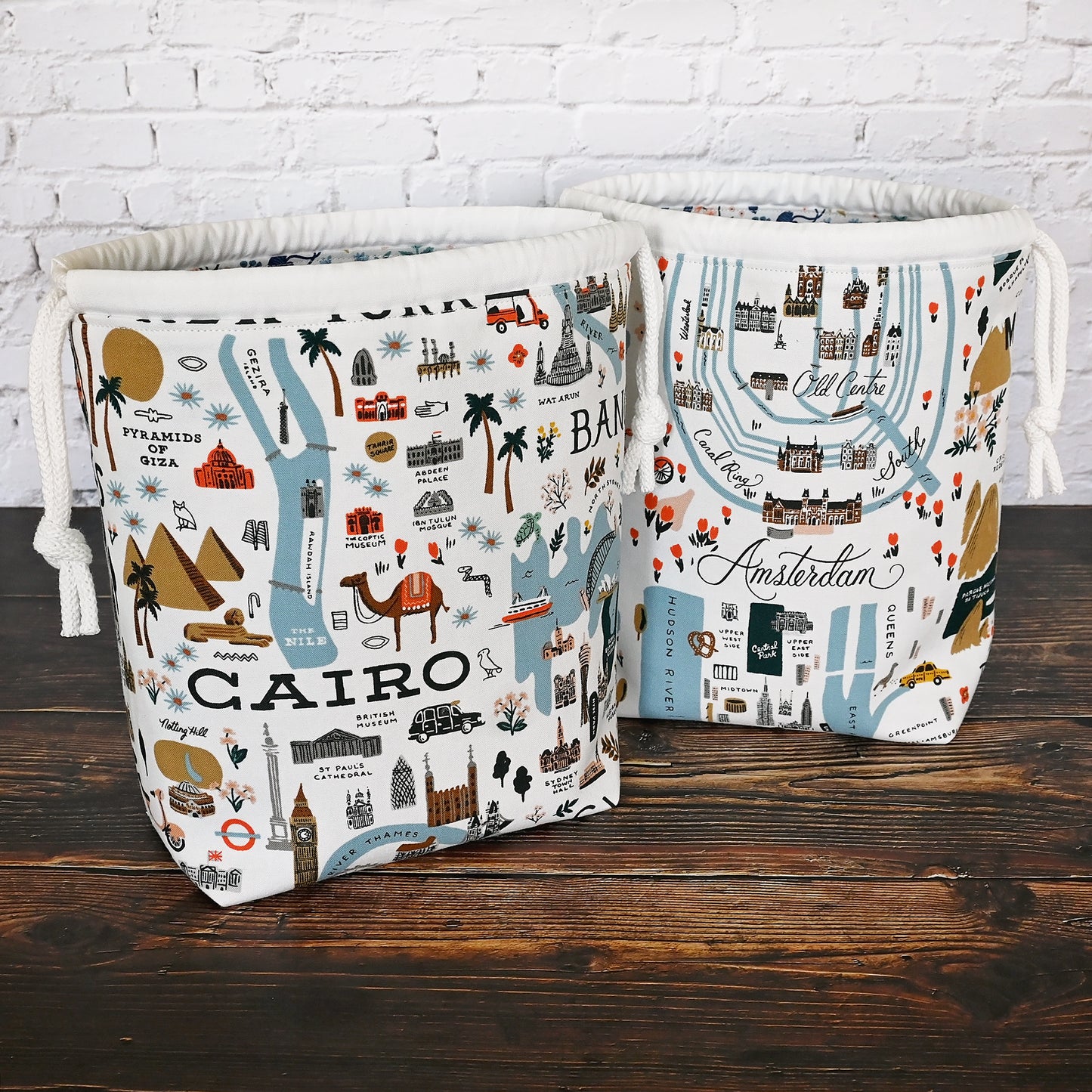 Fun drawstring project bags made from the World Traveller fabric collection by Rifle Paper Co. Bags come with a pretty floral lining and are available with or without pockets. Made in Canada by Yellow Petal Handmade.