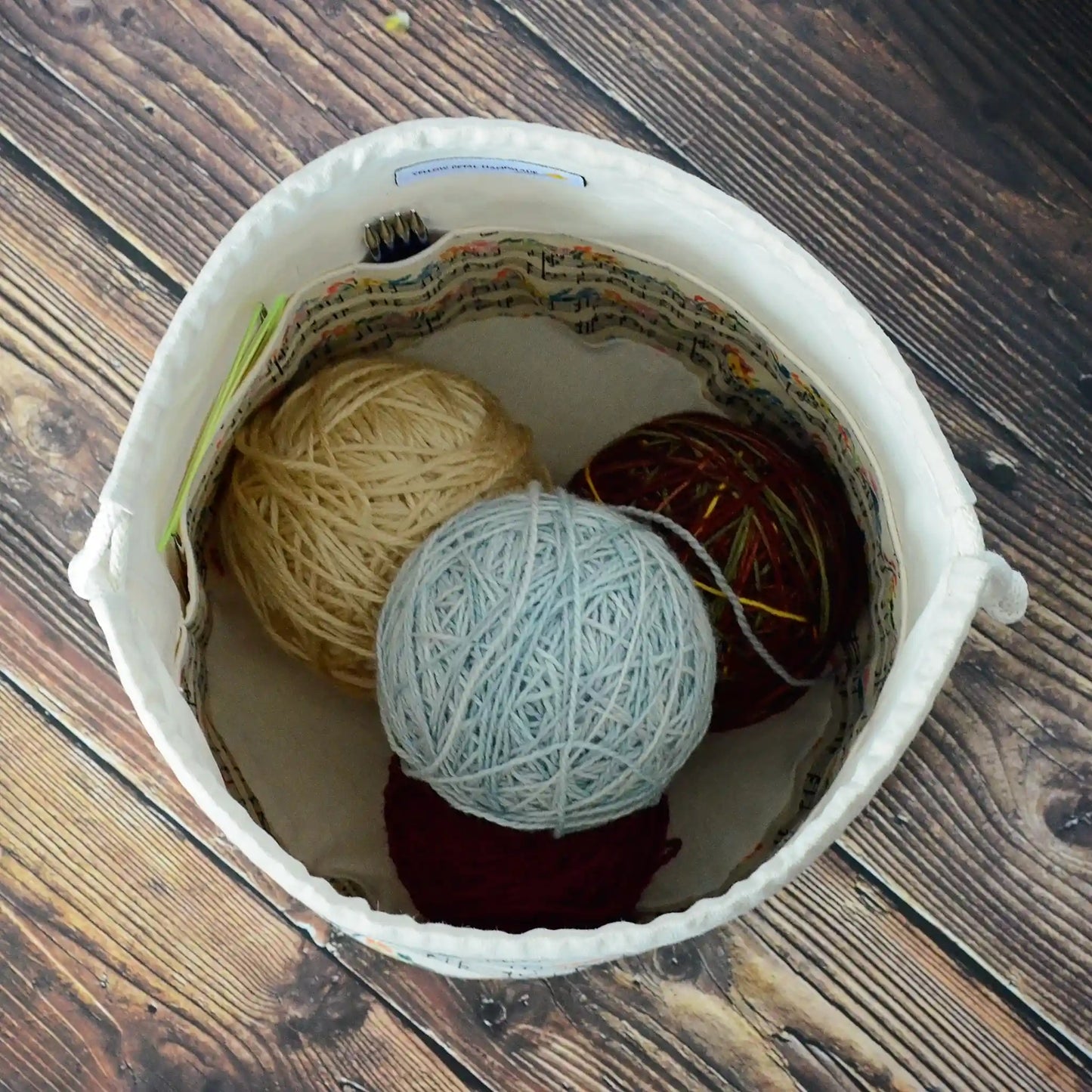 Music themed knitting project bag with drawstring. Made in Canada by Yellow Petal Handmade.