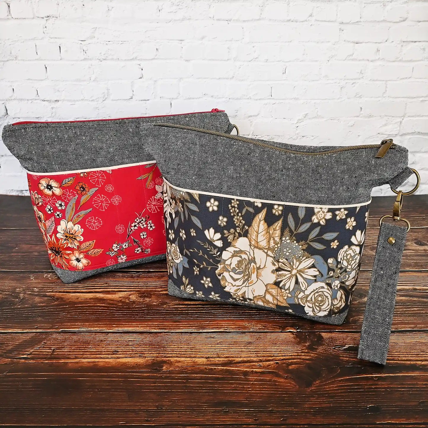 Beautiful linen project bag with exterior pockets made from a gorgeous navy floral cotton. Handmade in Canada by Yellow Petal Handmade.
