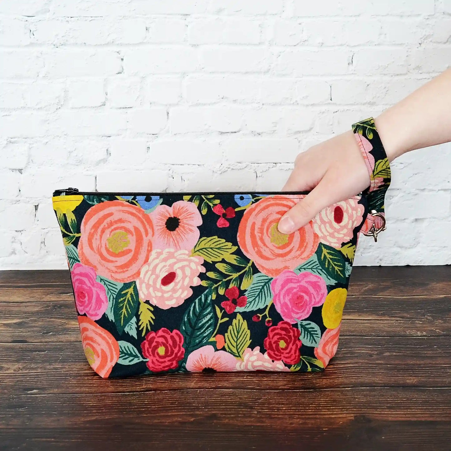 Canvas zippered project bag in a striking floral print with a black background. Designed for small projects using Rifle Paper Co. fabric. Made in Nova Scotia, Canada by Yellow Petal Handmade.