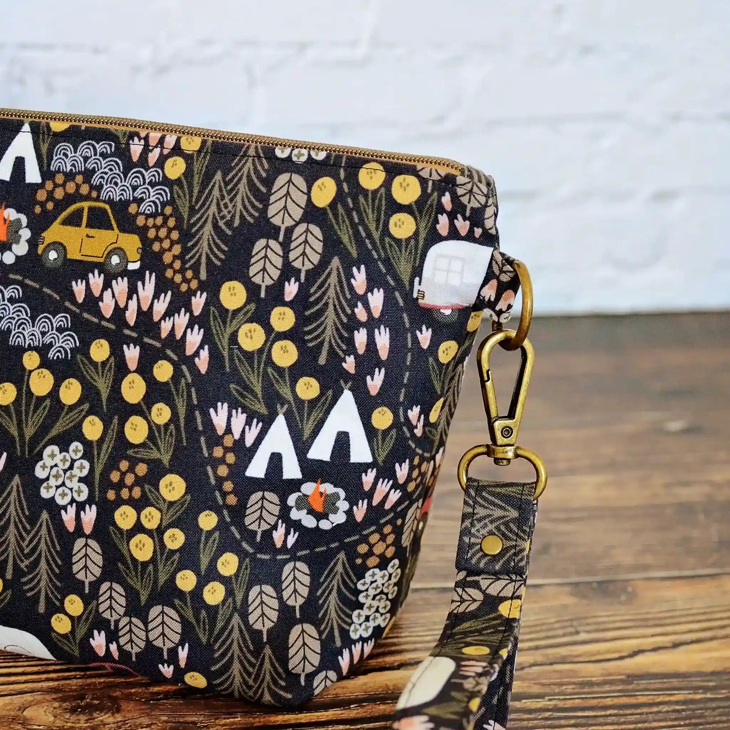 Small zippered project bag in camping fabric. Made in Canada by Yellow Petal Handmade.