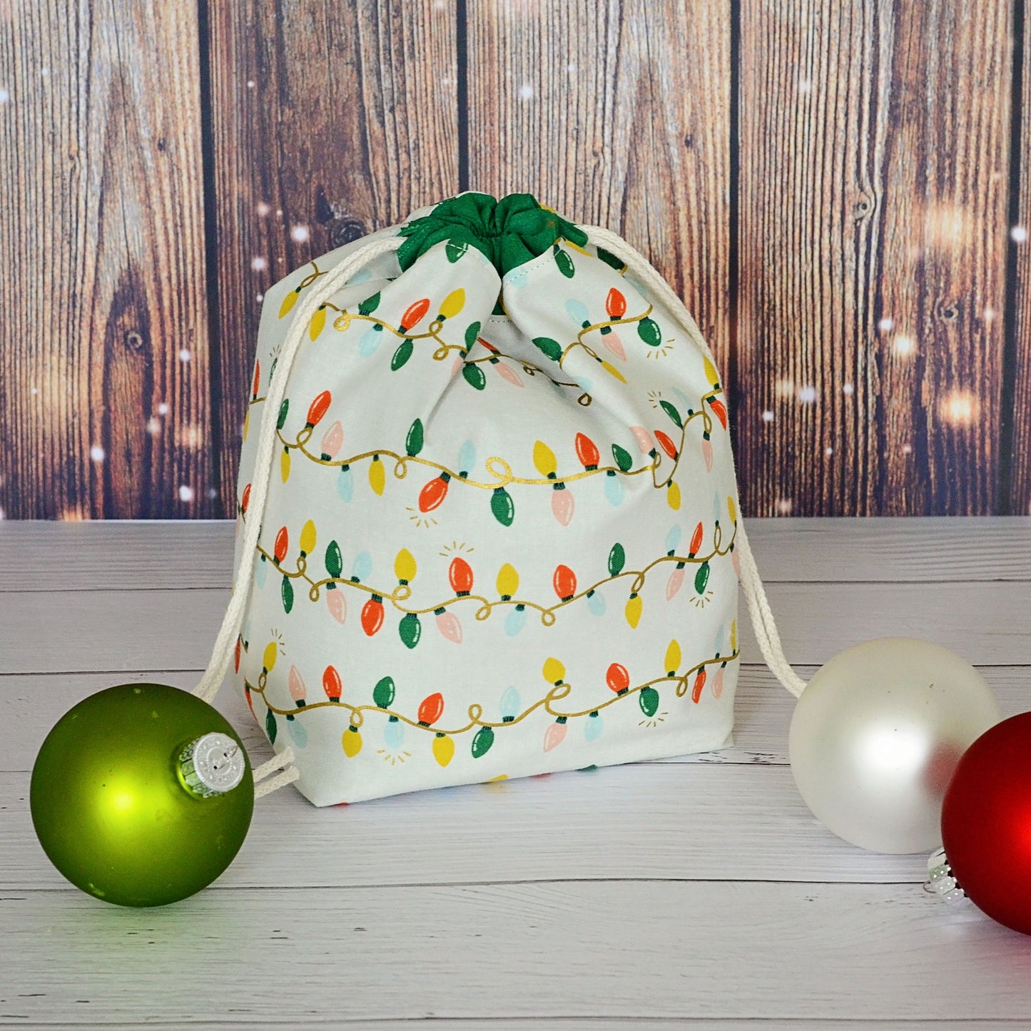 Christmas Lights gift bag or knitting bag, lined with a pretty green lining. Made by Yellow Petal Handmade in Nova Scotia, Canada.