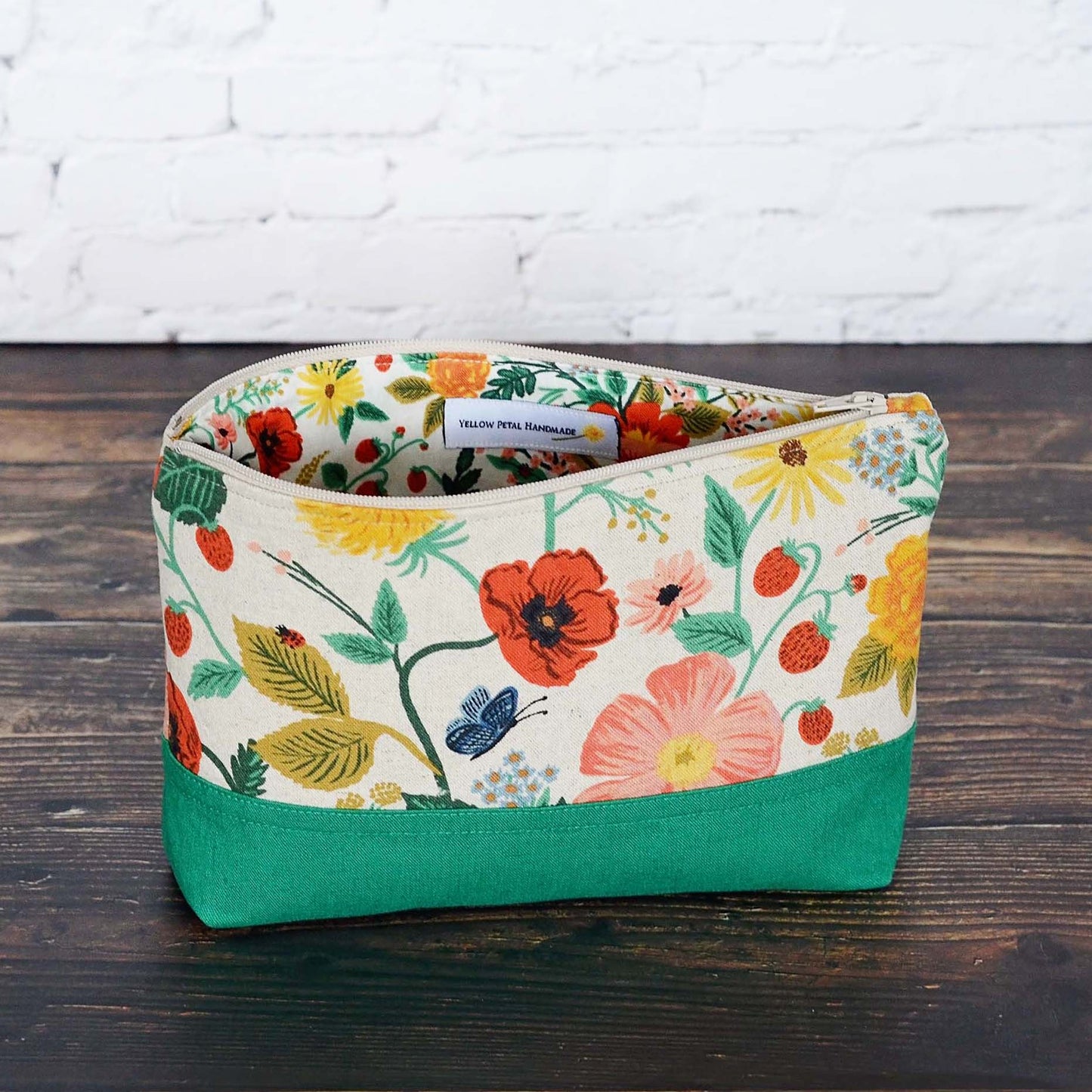 Canvas and linen pouch in Rifle Paper co fabric with poppies. Handmade in Canada by Yellow Petal Handmade.