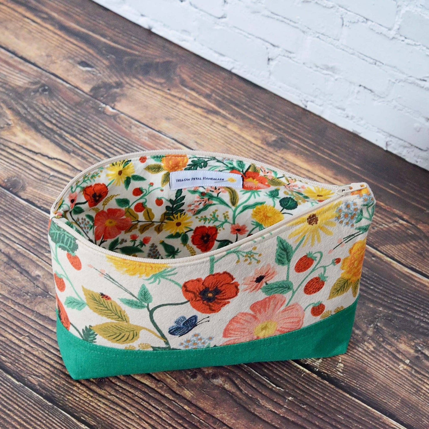 Floral and green canvas and linen accessory pouch in Camont fabrics by Rifle Paper Co. Made in Canada by Yellow Petal Handmade.