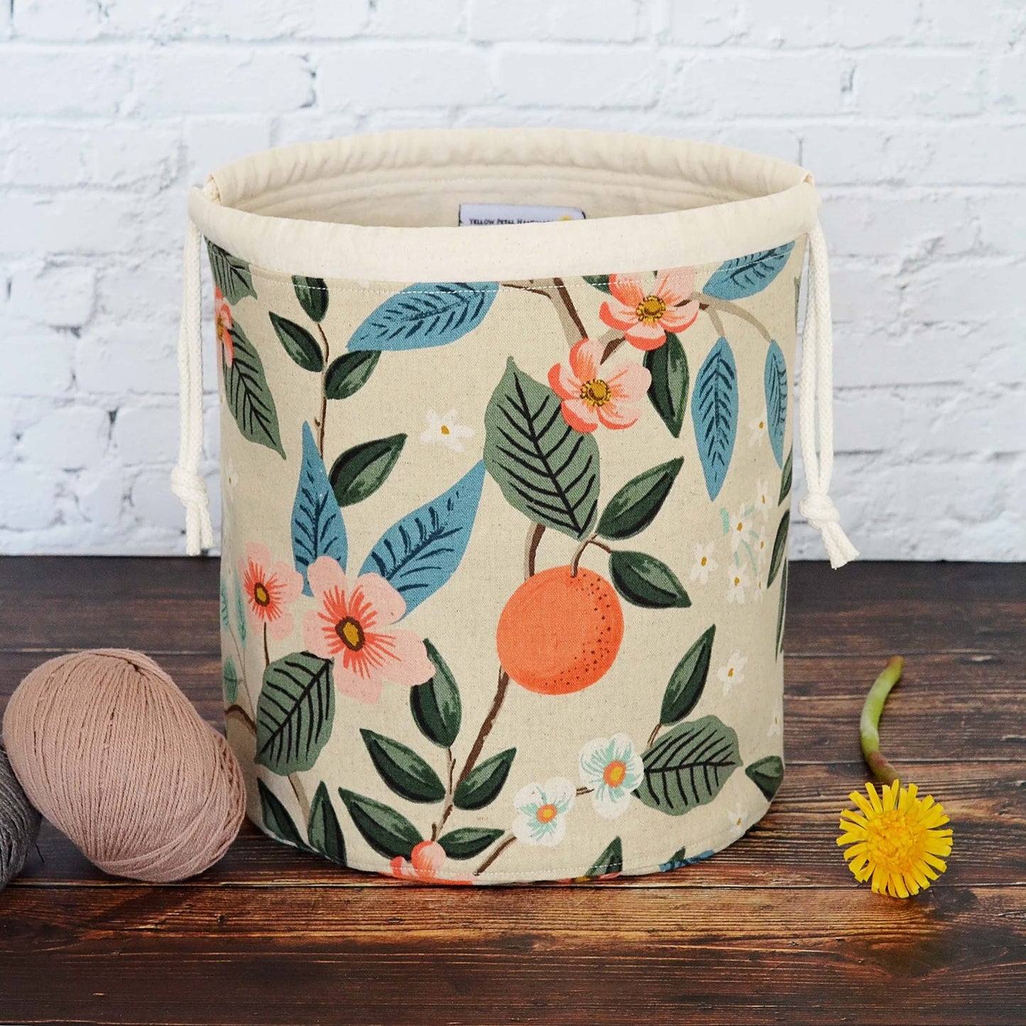 Canvas bucket bag with pockets in Rifle Paper Co. Canvas. Handmade in Canada by Yellow Petal Handmade.