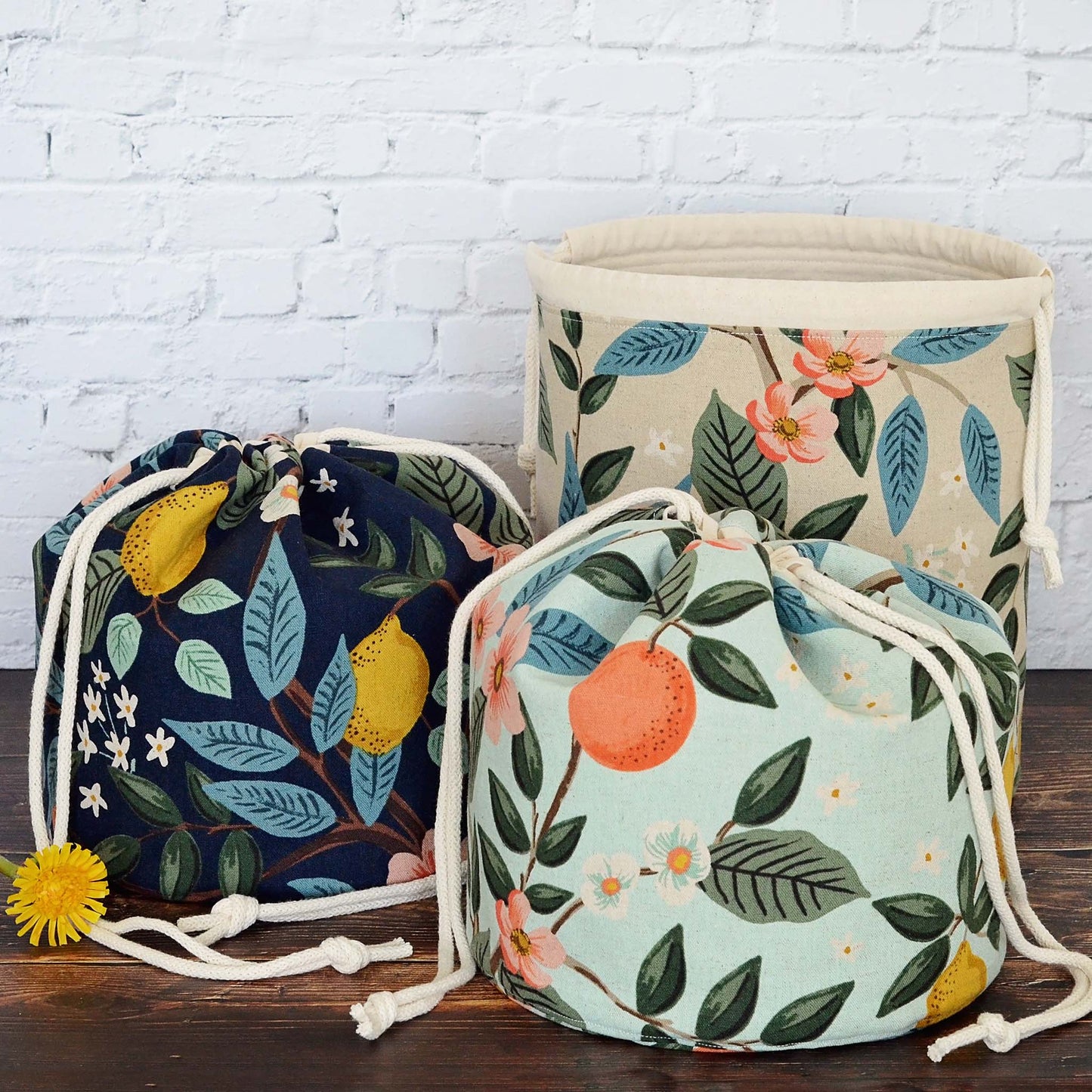 Canvas bucket bag with pockets in Rifle Paper Co. Canvas. Handmade in Canada by Yellow Petal Handmade.