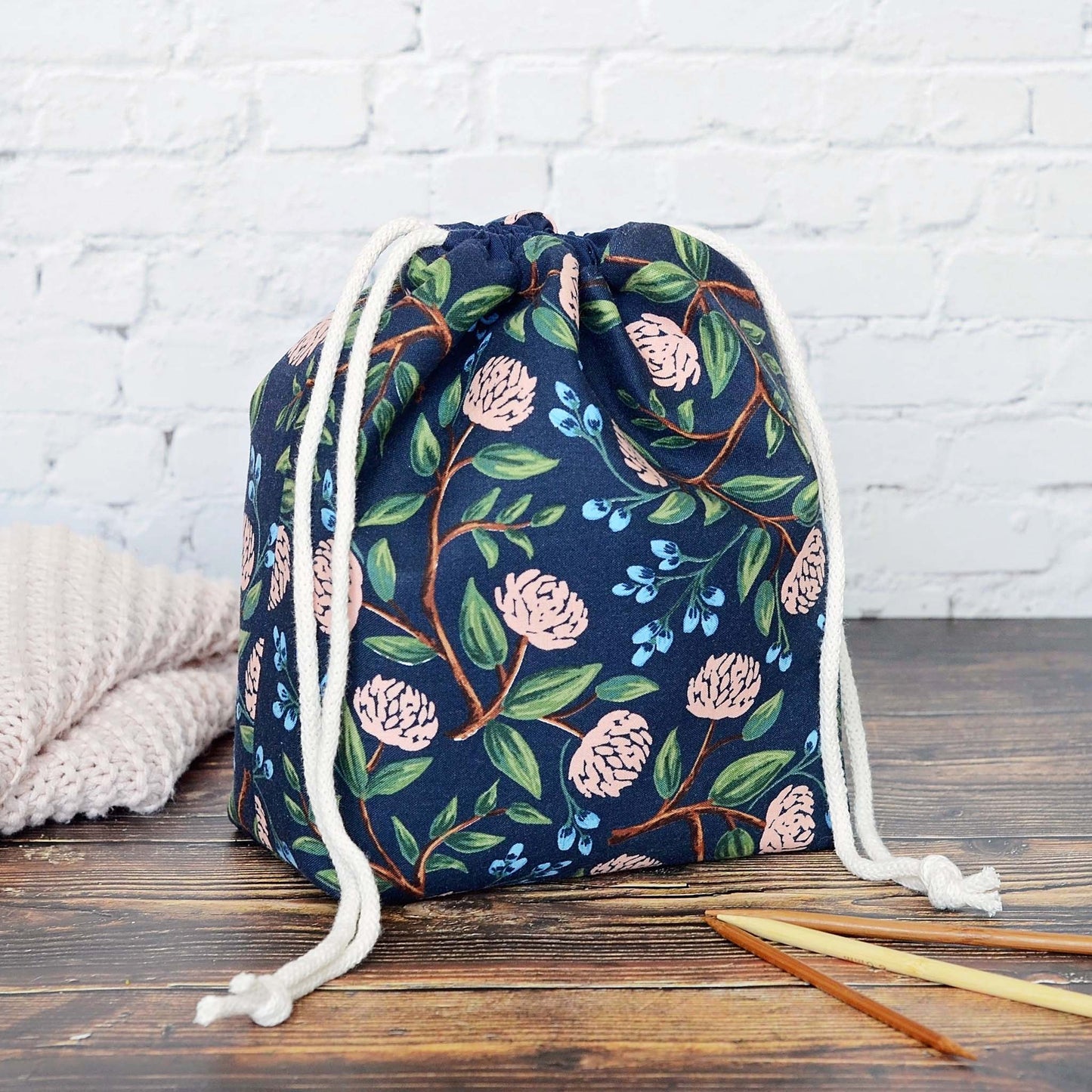 Navy floral drawstring project bag in Rifle Paper Co Peonies cotton. Made in Canada by Yellow Petal Handmade.