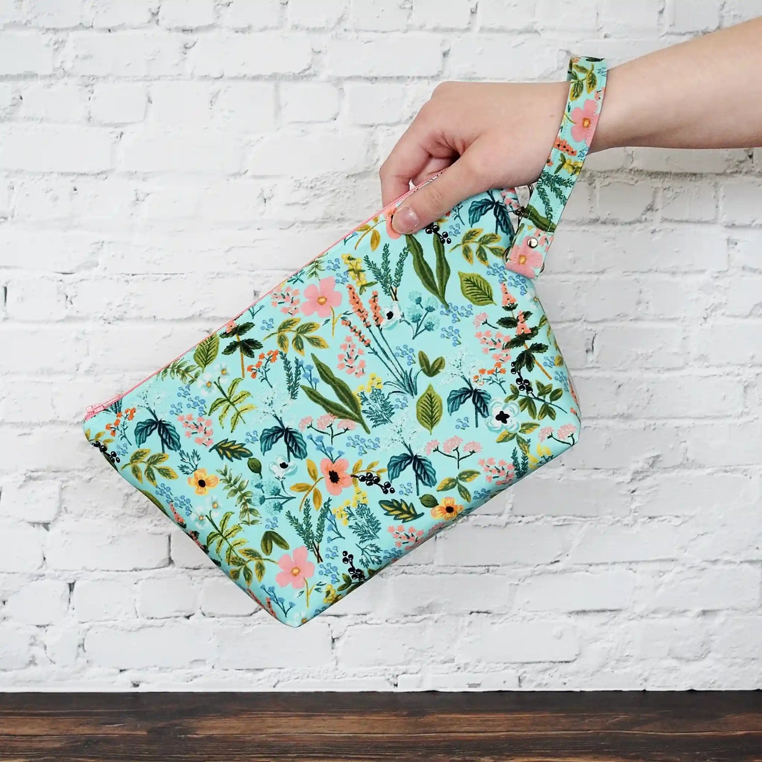 Aqua floral zippered project bag with wrist strap.  Made in Canada by Yellow Petal Handmade.