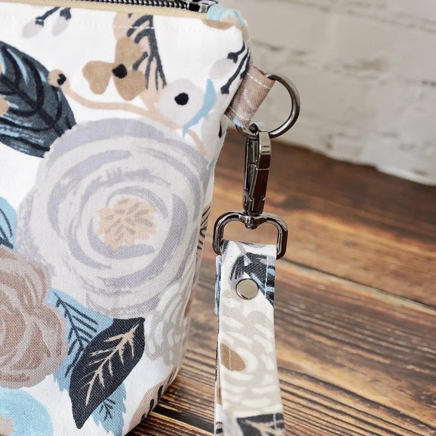 Grey and white floral canvas zippered pouch in Rifle Paper Co. Made in Nova Scotia, Canada by Yellow Petal Handmade.