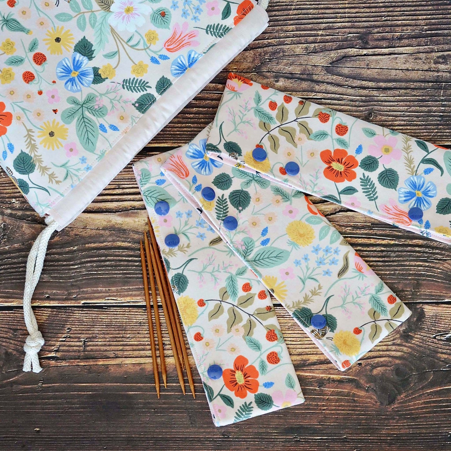Pretty pink dpn cozies in Strawberry Fields fabric by Rifle Paper Co. Made in Canada by Yellow Petal Handmade.