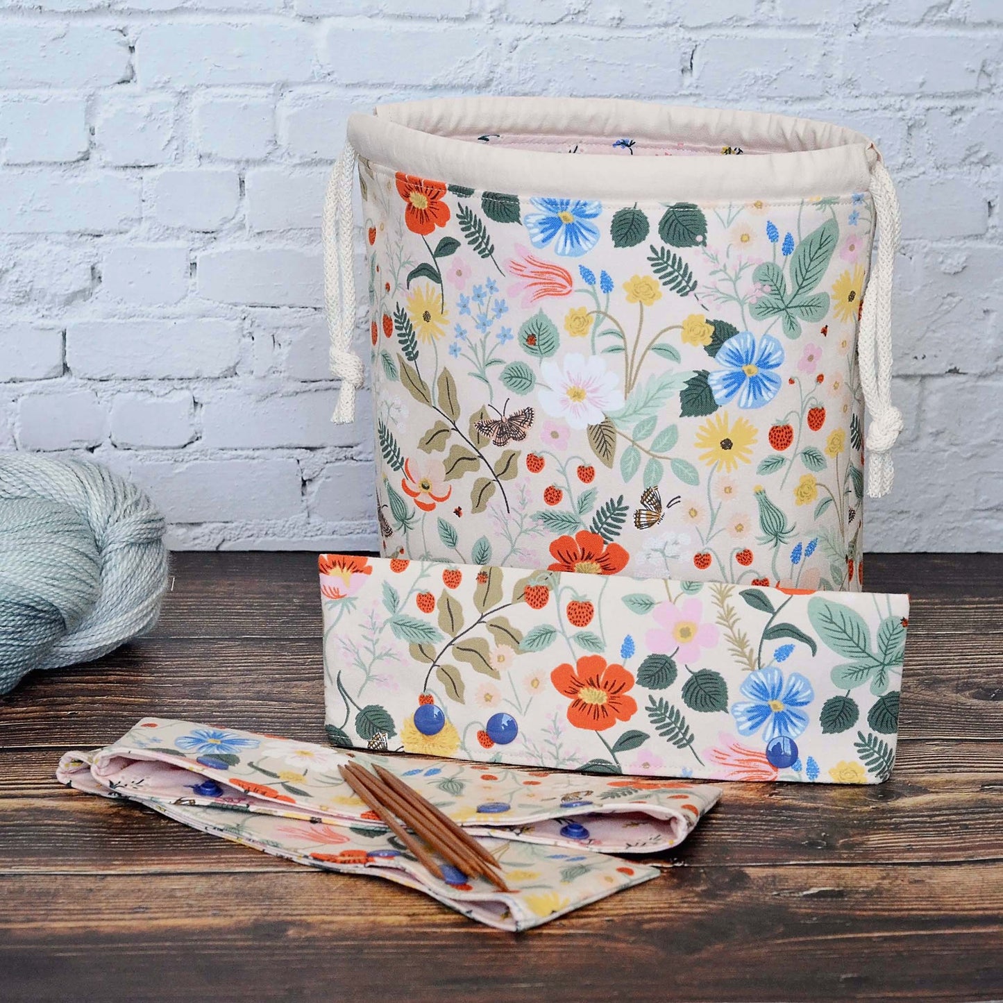 Pretty pink dpn cozies in Strawberry Fields fabric by Rifle Paper Co. Made in Canada by Yellow Petal Handmade.