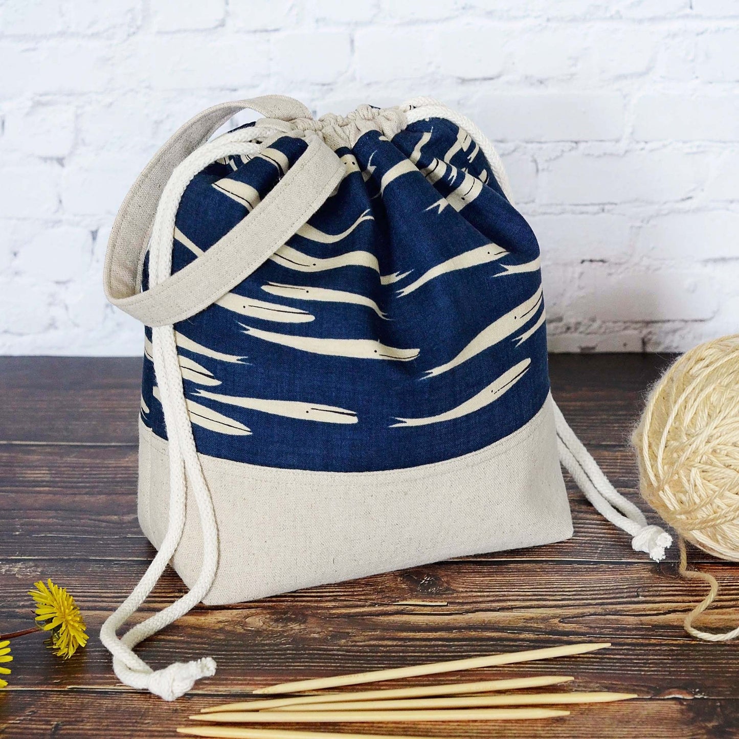 Whale themed project bag with drawstring and handle. Made from cottons and linen by Yellow Petal Handmade. On sale.