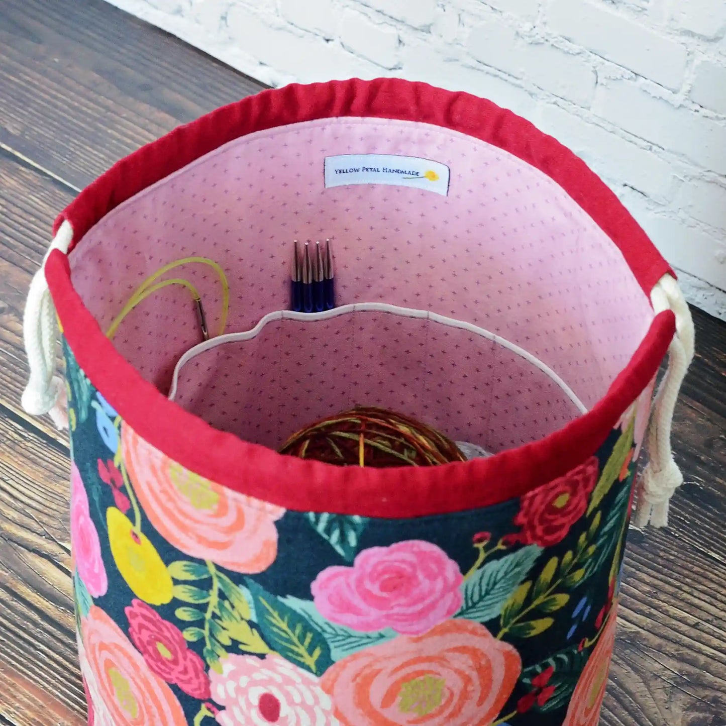 Stunning floral project bag in English Garden canvas by Rifle Paper Co.  Lined in a mauve cotton.  Made in Nova Scotia, Canada by Yellow Petal Handmade.