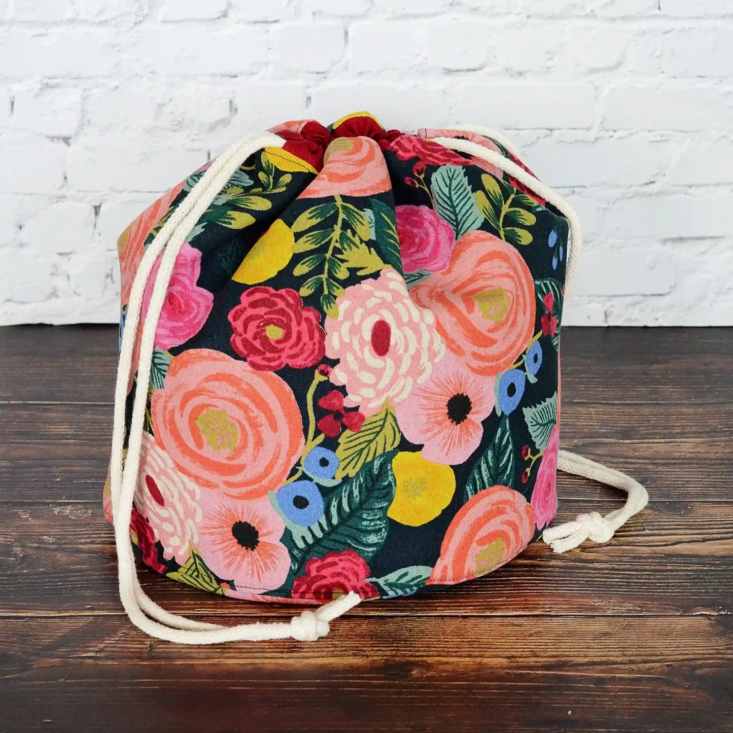 Stunning floral project bag in English Garden canvas by Rifle Paper Co.  Lined in a mauve cotton.  Made in Nova Scotia, Canada by Yellow Petal Handmade.