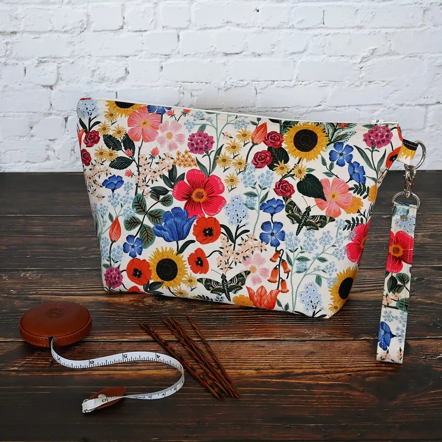 Pretty blush floral zippered pouch with wrist strap.  Made in Canada by Yellow Petal Handmade.