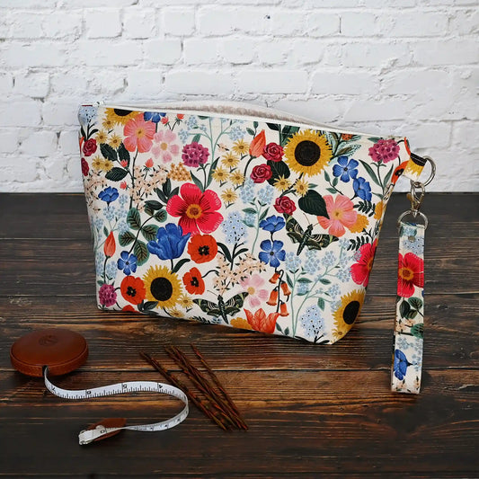 Pretty blush floral zippered pouch with wrist strap.  Made in Canada by Yellow Petal Handmade.