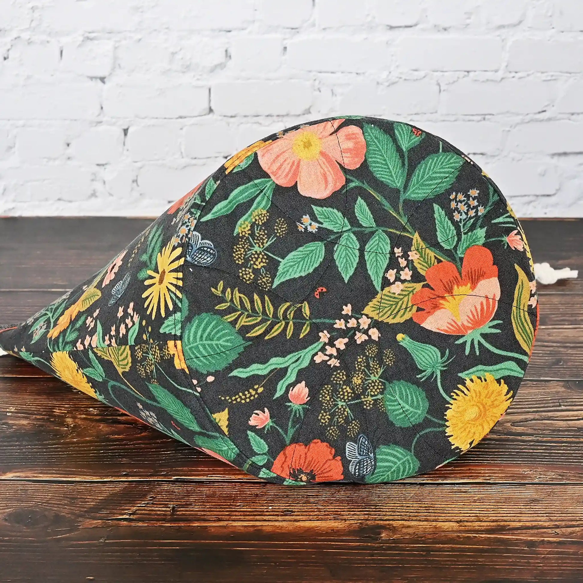 Black floral canvas bucket style project bag with pretty gold cotton interior.  Made from the Camont collection by Rifle Paper Co.  Made in Canada by Yellow Petal Handmade.