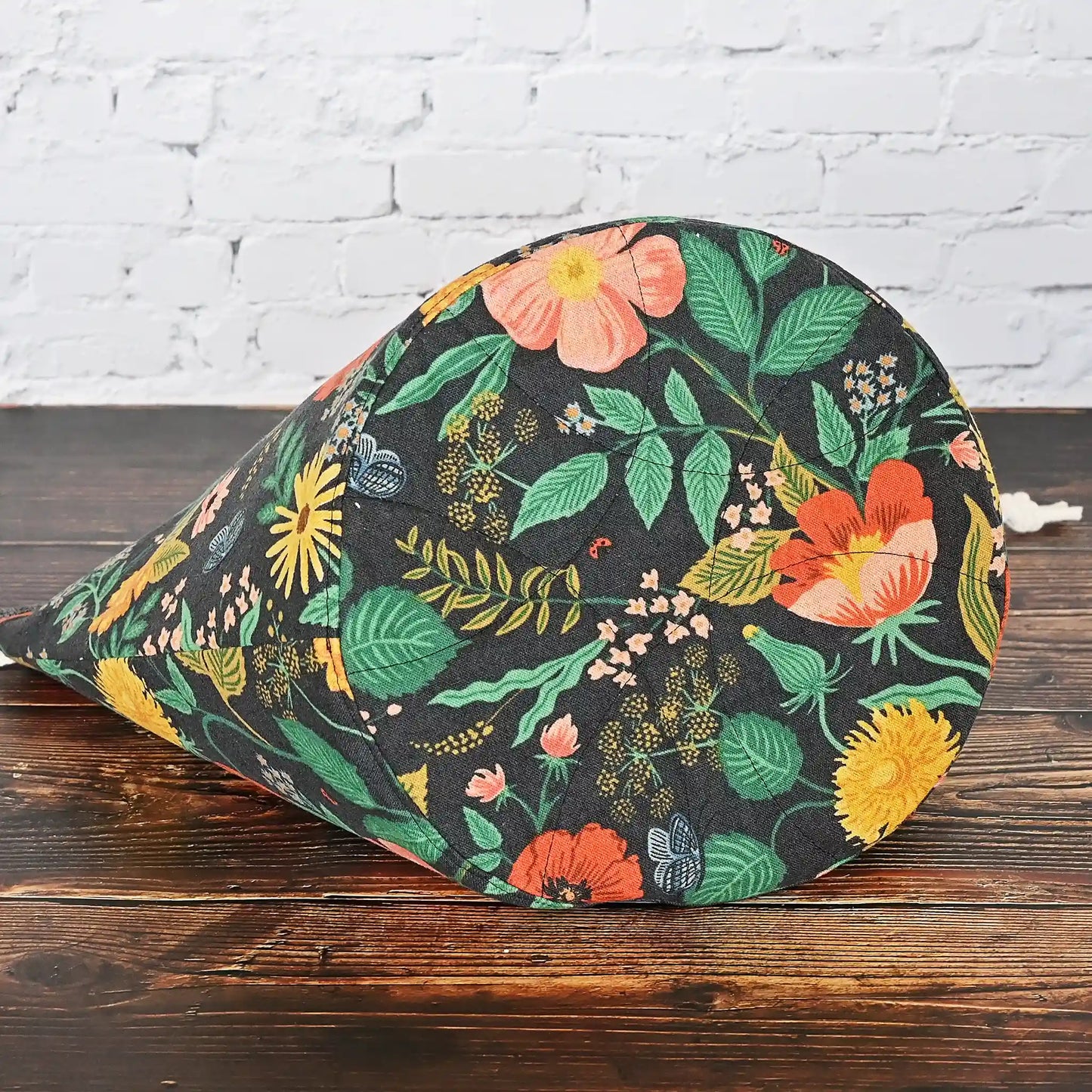 Black floral canvas bucket style project bag with pretty gold cotton interior.  Made from the Camont collection by Rifle Paper Co.  Made in Canada by Yellow Petal Handmade.