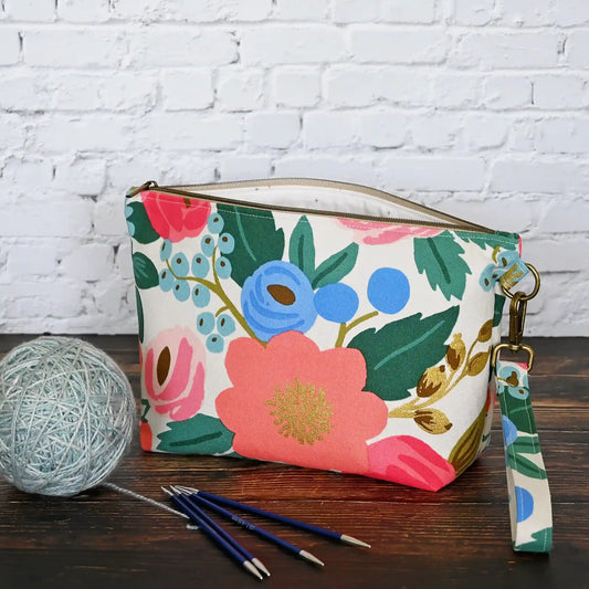 Cream floral canvas zippered pouch with removable wrist strap.  Made from Rifle Paper Co's Antique Garden.  Handmade in Nova Scotia, Canada.