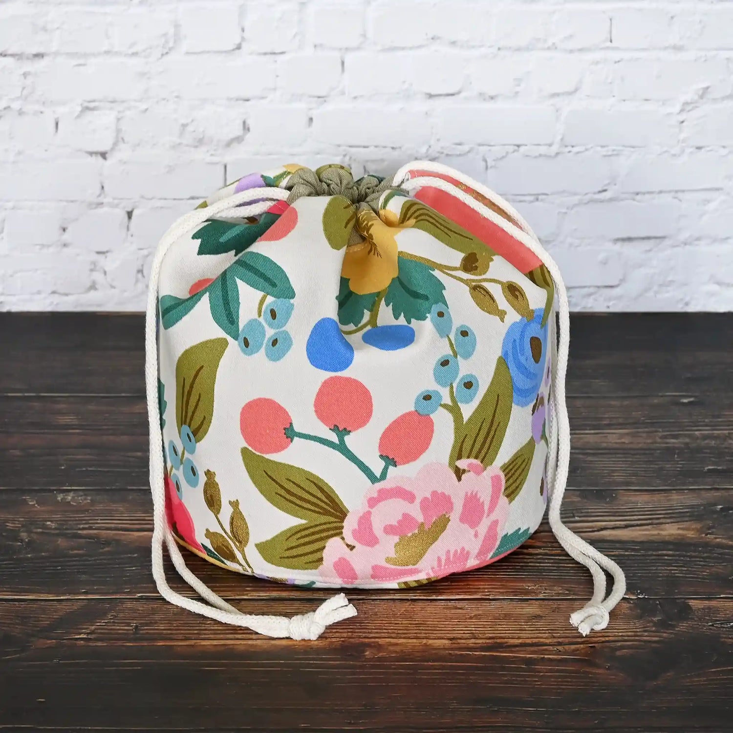 Canvas knitting project bag made from Rifle Paper Co's Antique Garden.  It has lots of pockets and is structured to stand alone.  Made in Canada by Yellow Petal Handmade.