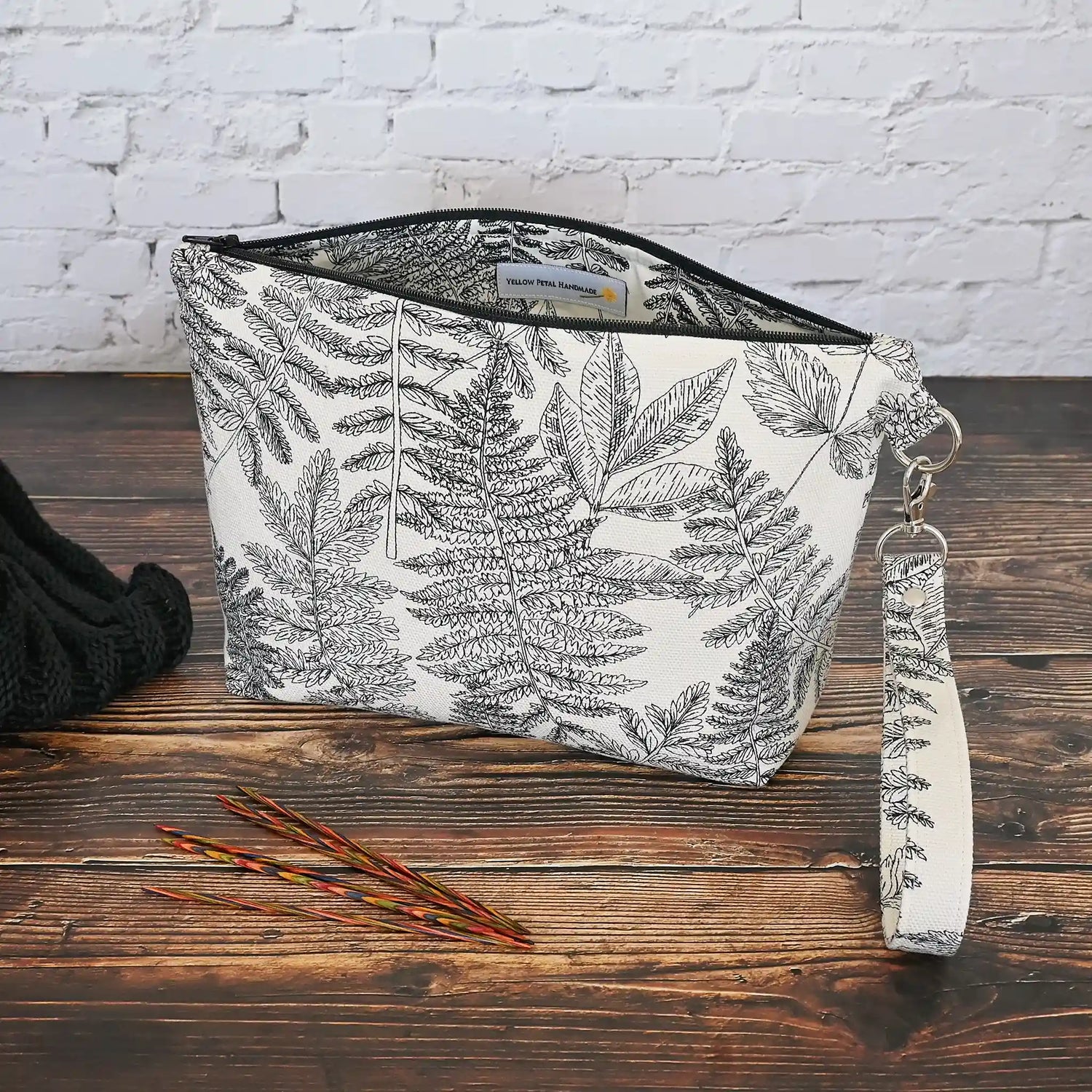 Beautiful fern print pouch made from a cream and black canvas and lined in a cotton of the same pattern.  This pouch is great for your small projects or could be used for pretty much anything!  Made in Canada by Yellow Petal Handmade.
