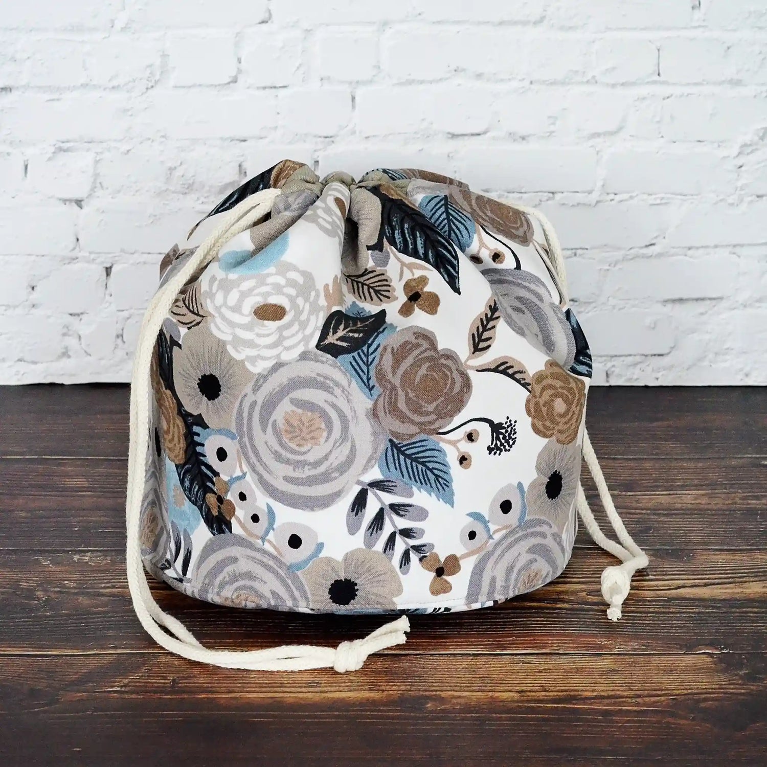Pretty grey floral bucket bag for knitting or crochet in canvas by Rifle Paper Co.  Made in Nova Scotia by Yellow Petal Handmade.