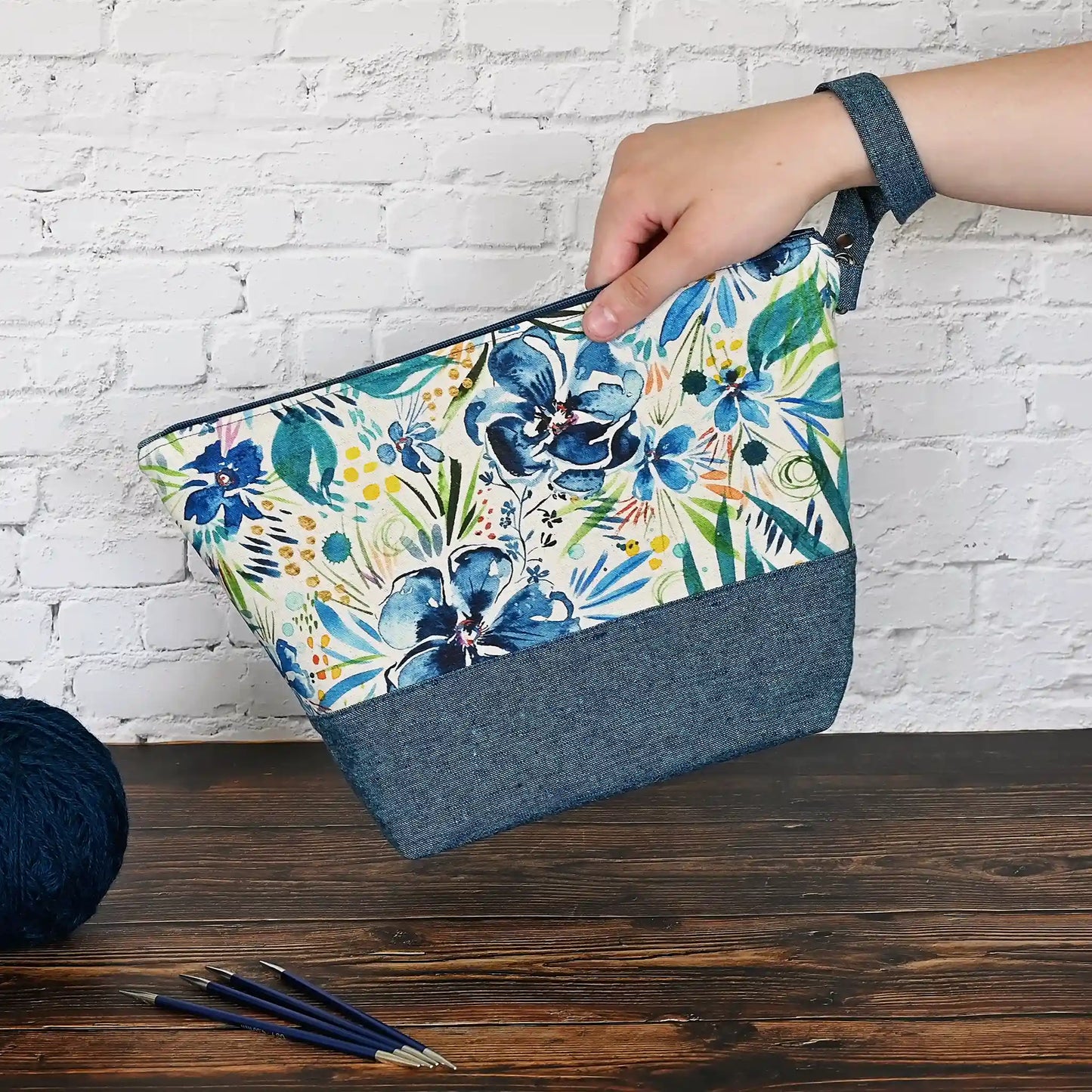 Zippered linen project bag in inky watercolour florals and paired with a peacock blue linen.  Made in Canada by Yellow Petal Handmade.