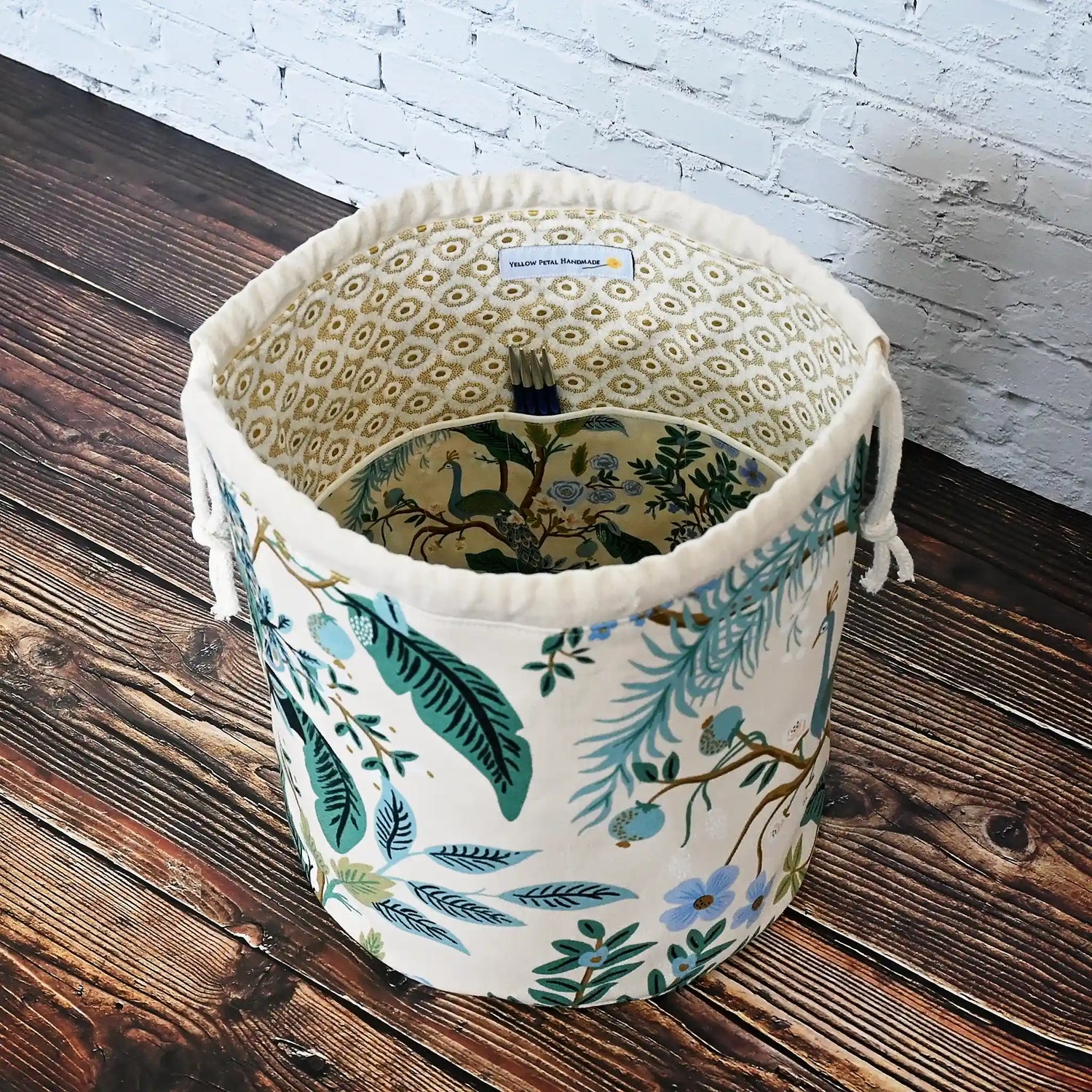 Beautiful canvas bucket bag in Rifle Paper Co's Antique Garden fabric, featuring green and teal florals and peacocks.  Made in Nova Scotia, Canada by Yellow Petal Handmade.