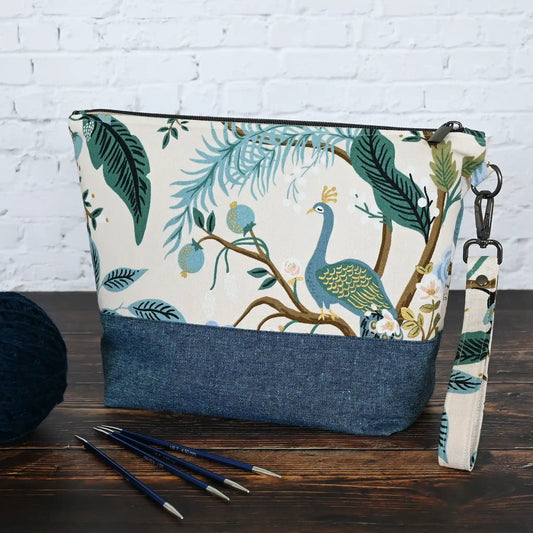 Beautiful two tone canvas and linen knitting project bag in Rifle Paper Co's Antique Garden fabric featuring green and teal florals and peacocks.  Handmade in Canada by Yellow Petal Handmade.