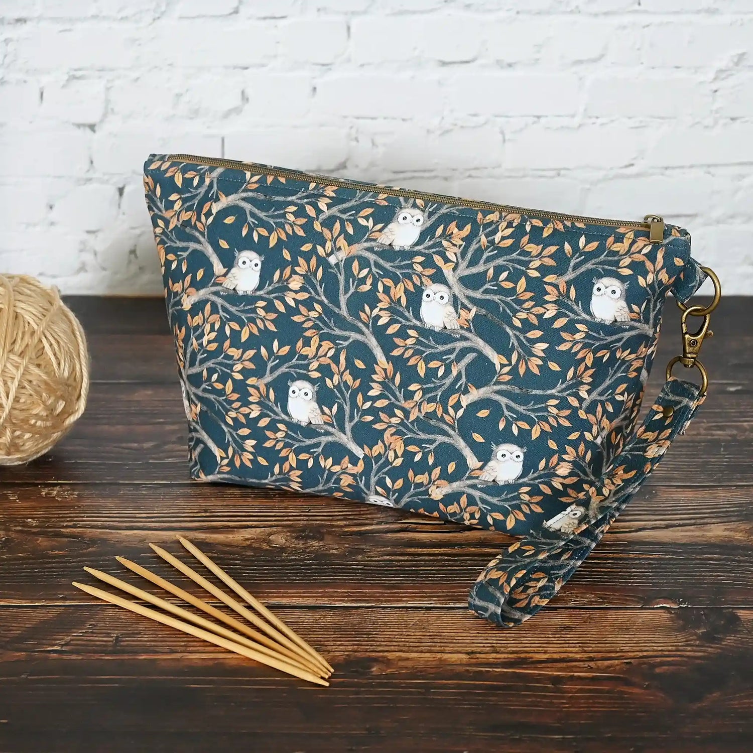 Zippered pouch in an adorable navy owl print.  Made in Canada by Yellow Petal Handmade.