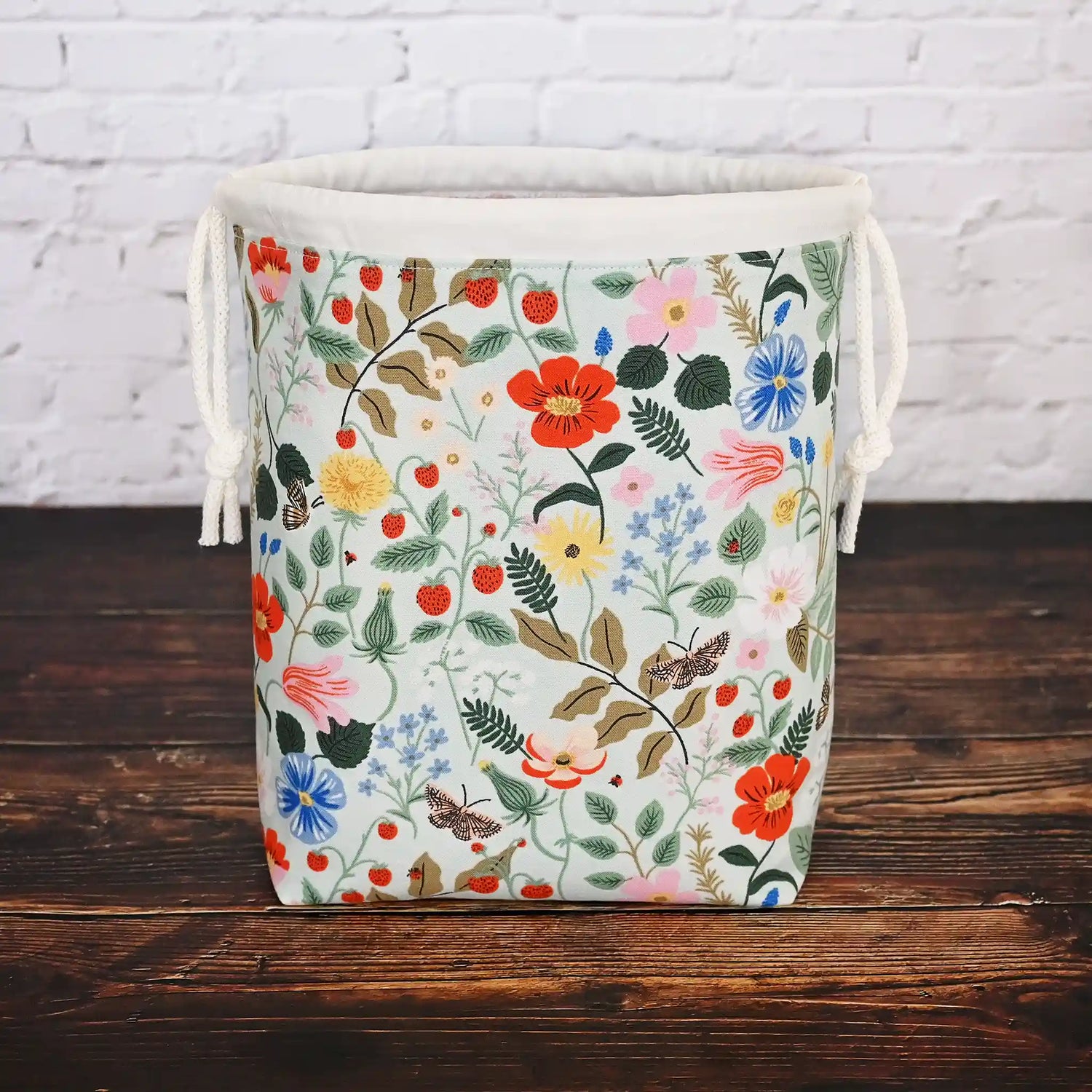 Pretty mint floral drawstring project bag made from Rifle Paper Co's Strawberry Fields Collection.  Lined in a delicate pink floral.  Made in Nova Scotia, Canada by Yellow Petal Handmade.