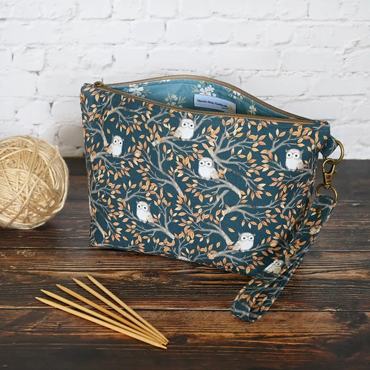 Zippered pouch in an adorable navy owl print.  Made in Canada by Yellow Petal Handmade.