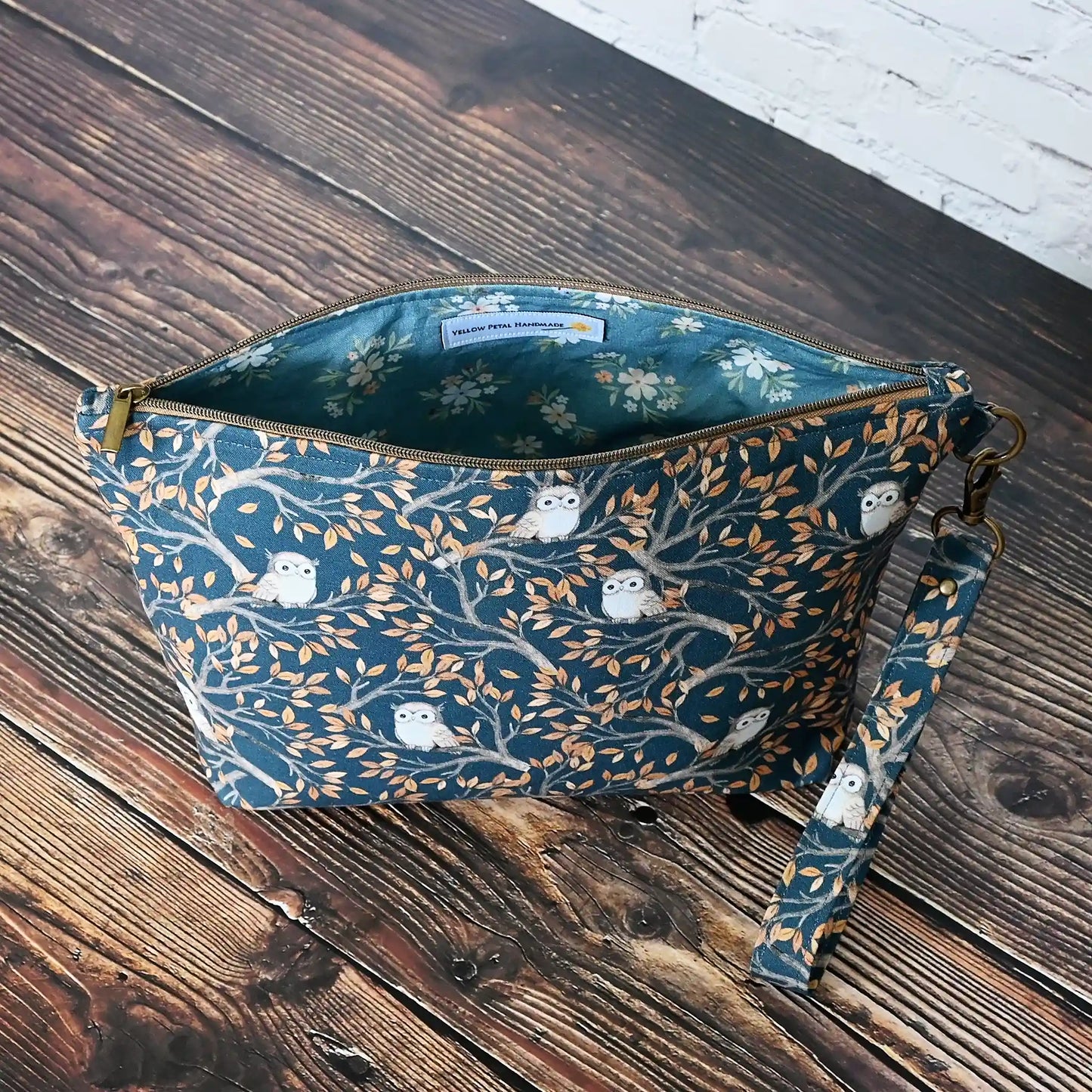 Zippered pouch in an adorable navy owl print.  Made in Canada by Yellow Petal Handmade.