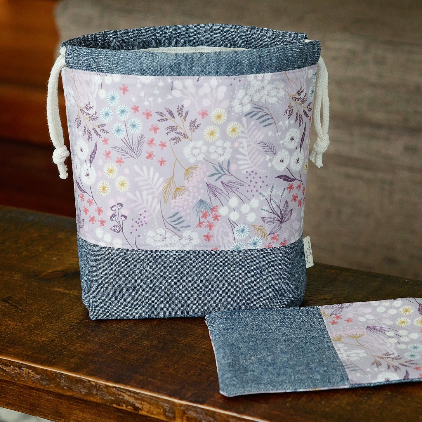 Mauve floral and indigo linen knitting project bag and pouch set.