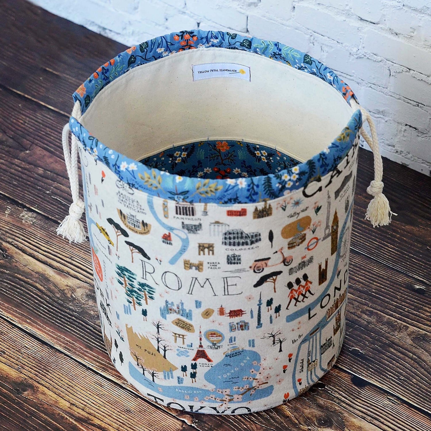 Travel themed bucket style knitting bag with plenty of interior pockets.  Made from the Bon Voyage collection by Rifle Paper Co.  Made in Canada by Yellow Petal Handmade.