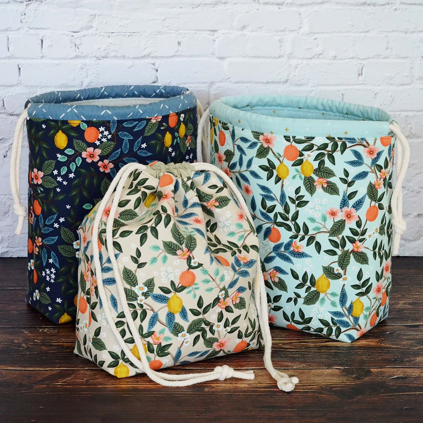 Collection of Knitting Bags in Rifle Paper Co Bramble Fabric with citrus and floral print.  Made in Canada by Yellow Petal Handmade.