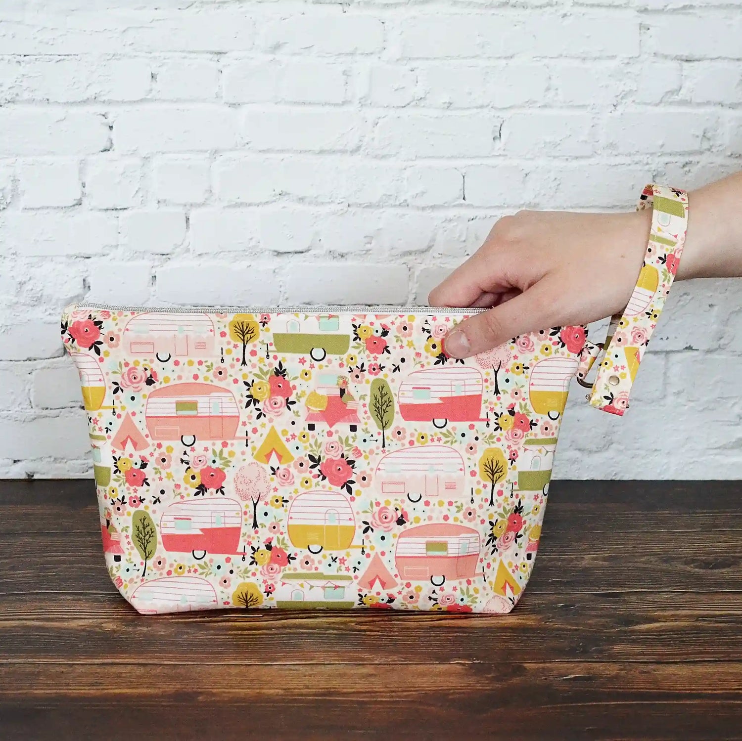 Vintage camper themed sock project bag with removable strap.  Lined in a pretty pink floral. Made in Canada by Yellow Petal Handmade. 
