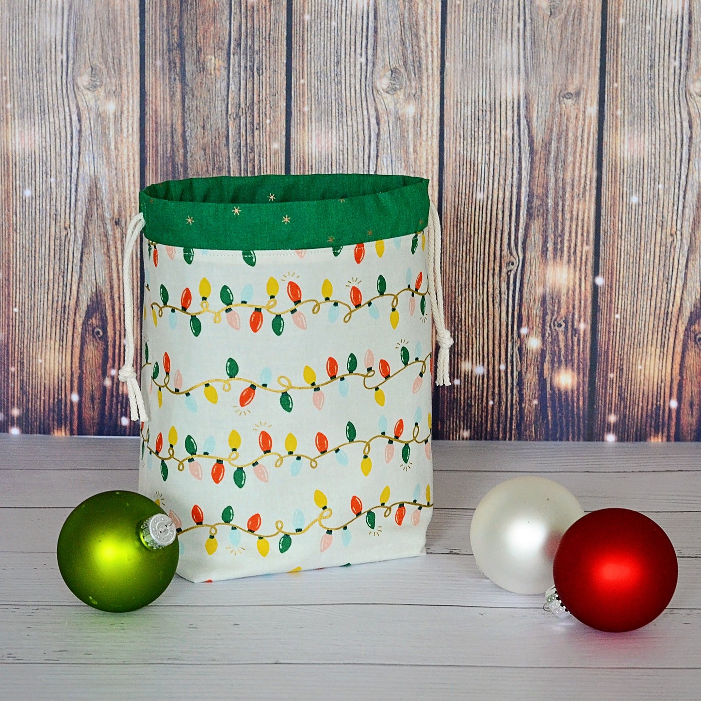 Christmas Lights gift bag or knitting bag, lined with a pretty green lining.  Made by Yellow Petal Handmade in Nova Scotia, Canada.