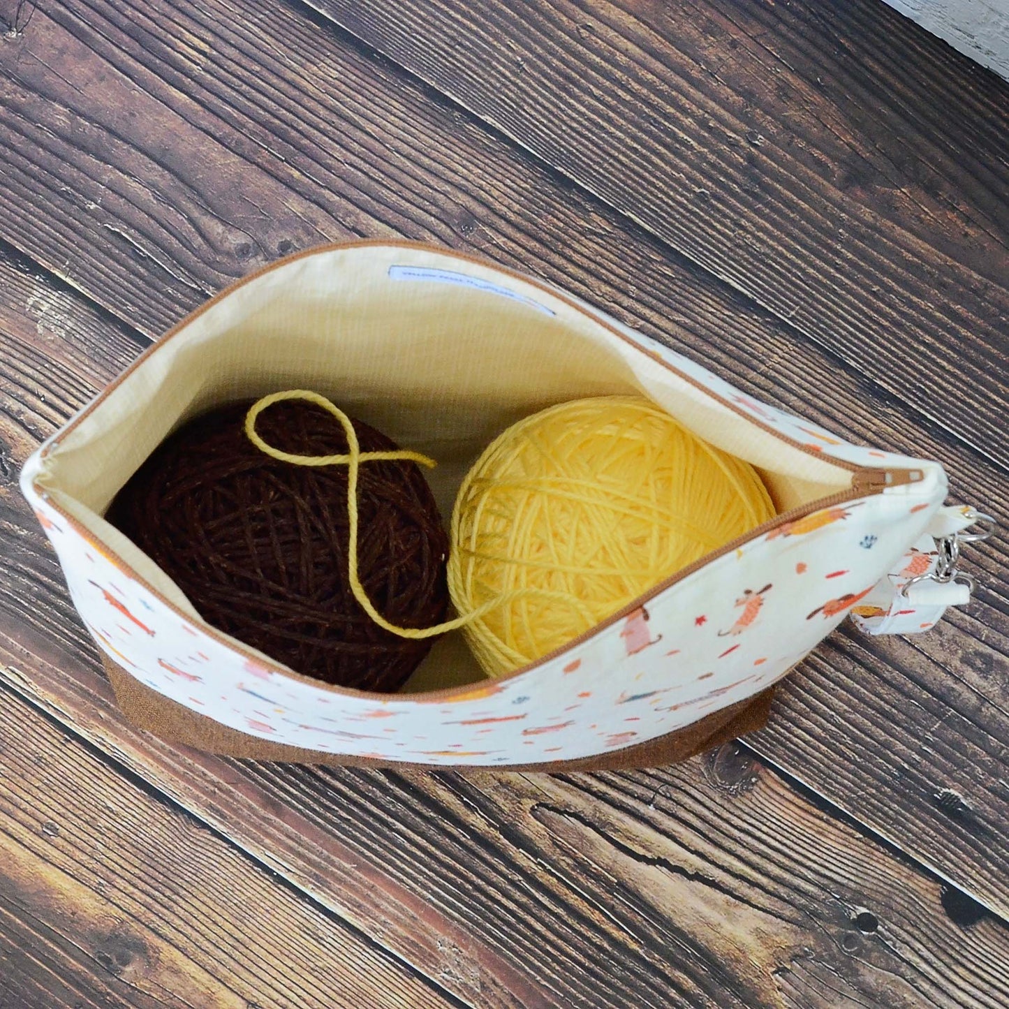 Fall themed knitting project bag with cute dogs and leaves.  Handmade in Nova Scotia, Canada by Yellow Petal Handmade.