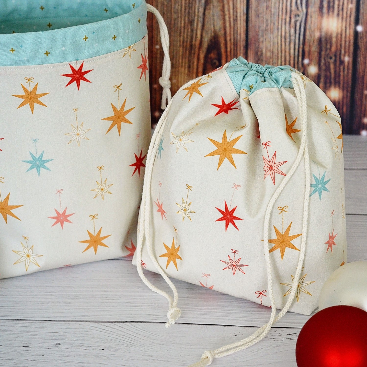 Pretty Christmas Stars bags with an aqua lining and gold accents.  Handmade in Canada.