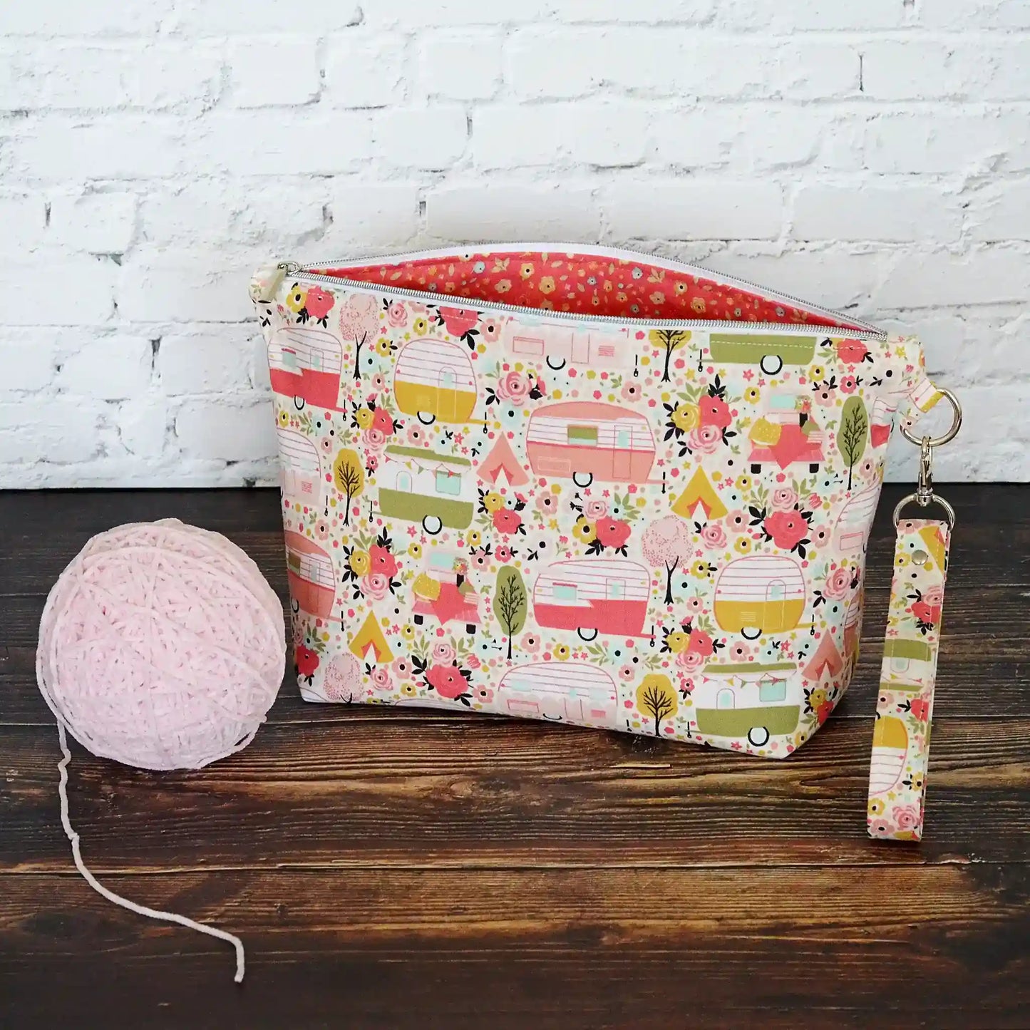 Vintage camper themed sock project bag with removable strap.  Lined in a pretty pink floral. Made in Canada by Yellow Petal Handmade. 