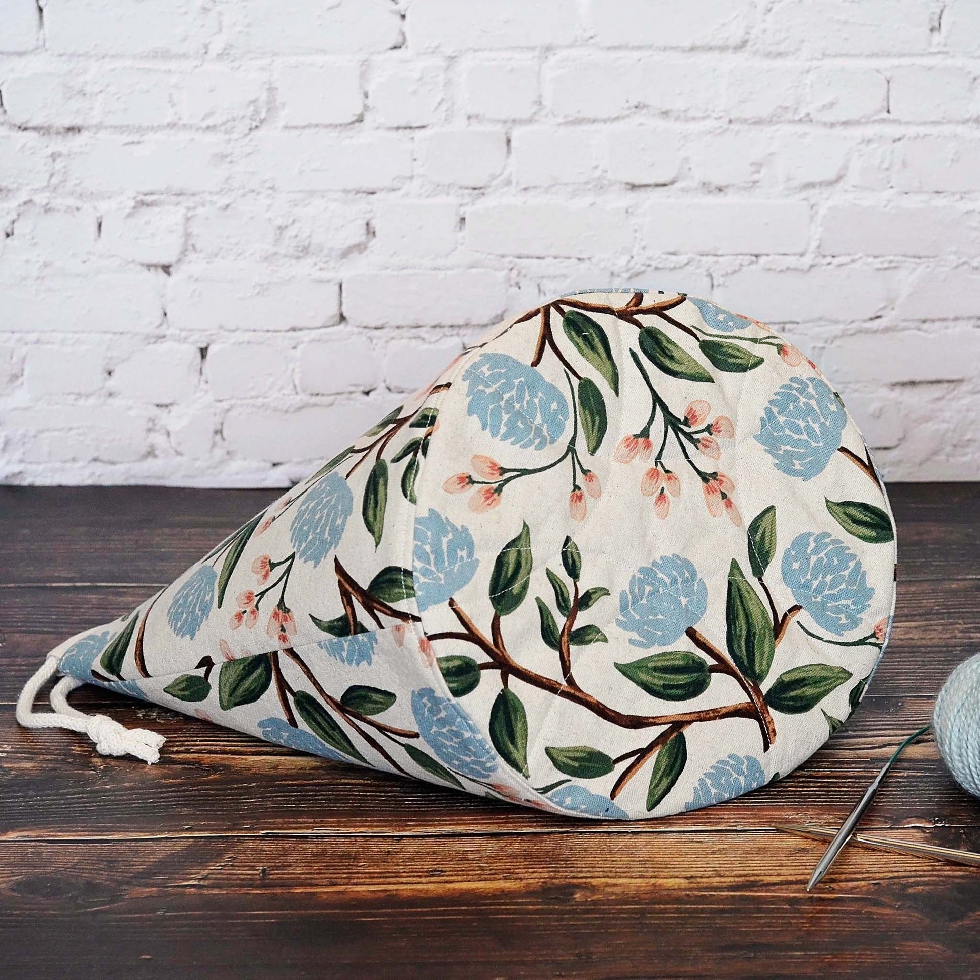 Peony canvas bucket bag with quilted bottom in fabric from Rifle Paper Co.  Handmade in Canada by Yellow Petal Handmade.