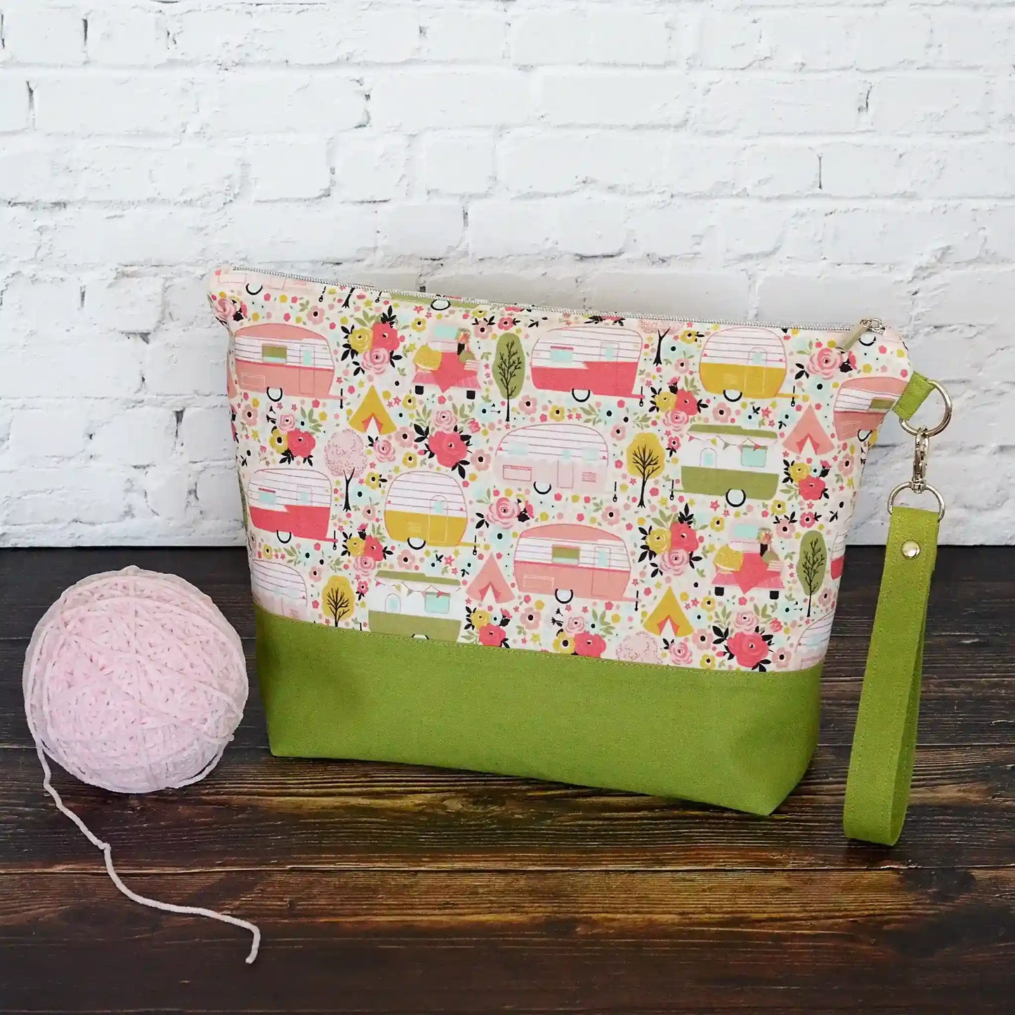 Vintage Camper themed project bag with zipper, pockets and a removable strap.  Paired with a lime green linen and lined in a pretty floral.  Made in Canada by Yellow Petal Handmade.