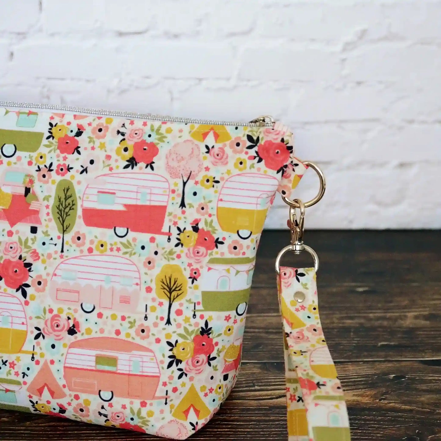 Vintage camper themed sock project bag with removable strap.  Lined in a pretty pink floral. Made in Canada by Yellow Petal Handmade. 