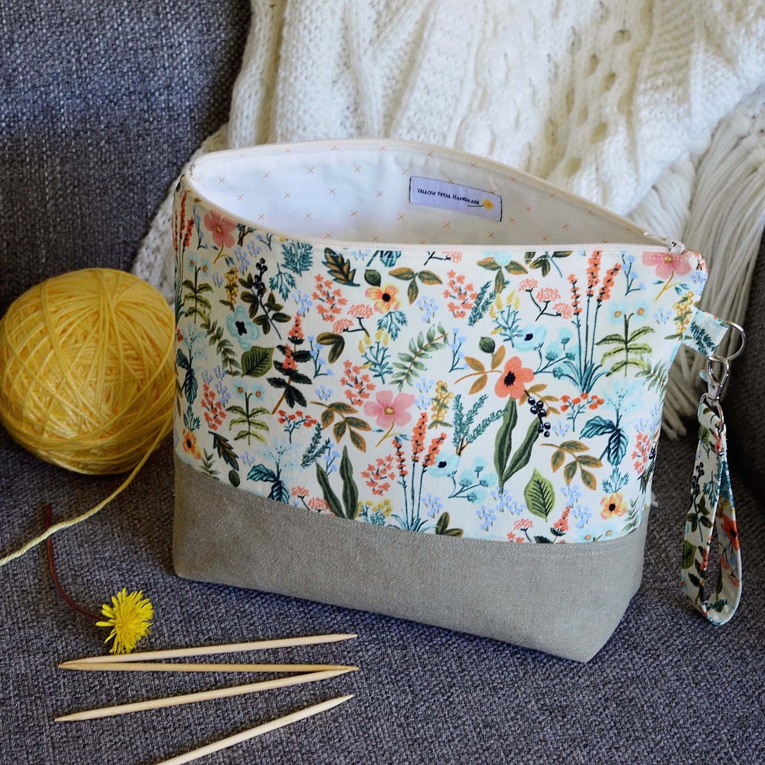 Zippered project bag in Rifle Paper Amalfi Herb Garden fabric paired with a Kaufman linen.  Comes with removable strap.  Made in Canada by Yellow Petal Handmade.