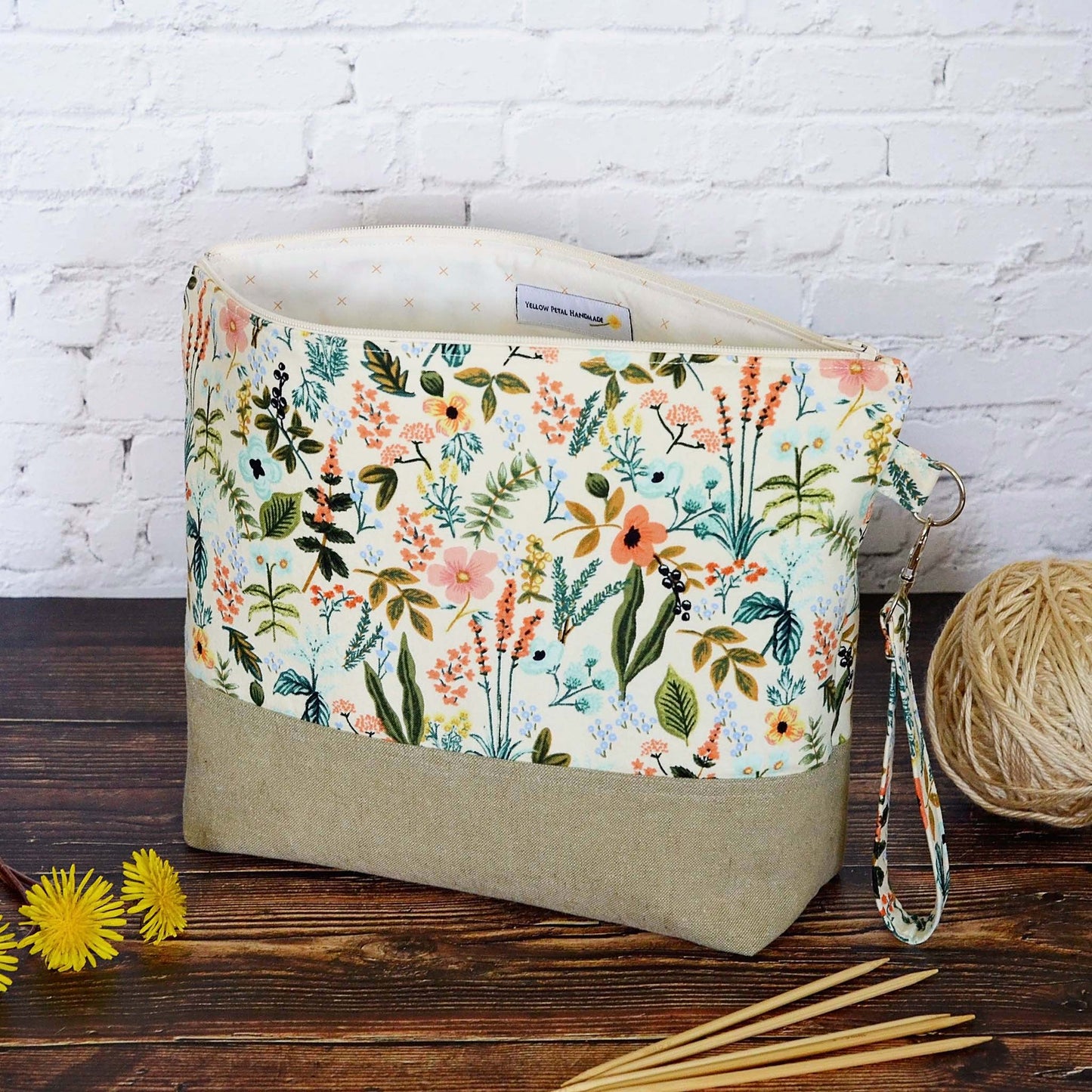 Zippered project bag in Rifle Paper Amalfi fabric paired with a Kaufman linen.  Comes with removable strap.  Made in Canada by Yellow Petal Handmade.