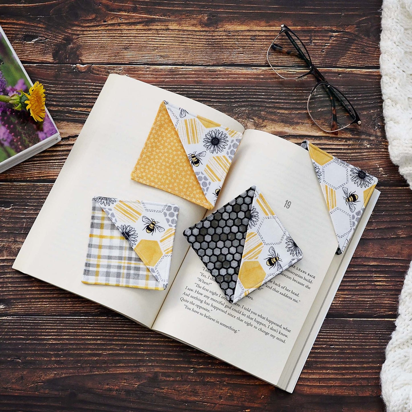 Fun bee corner bookmarks in three fabric choices, yellow, charcoal and plaid.  Made in Canada by Yellow Petal Handmade.