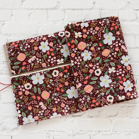 Quilted crochet hook wrap in burgundy floral Rifle Paper Co fabric.  Made in Canada by Yellow Petal Handmade.