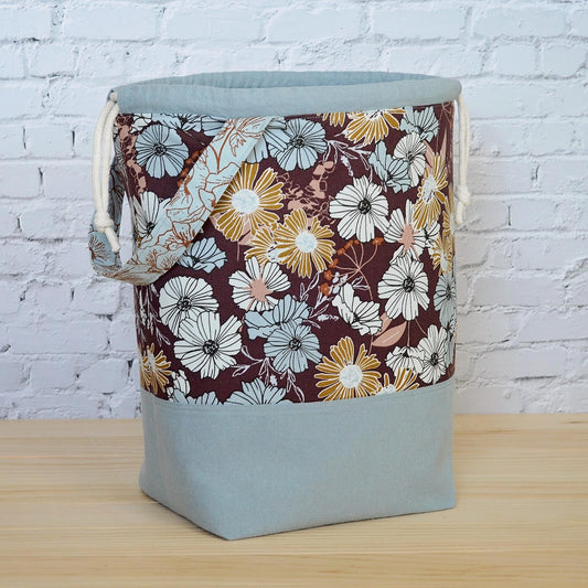 Large knitting bag with pockets and grab handle, made in beautiful floral fabric.  Made by Yellow Petal Handmade in Canada.